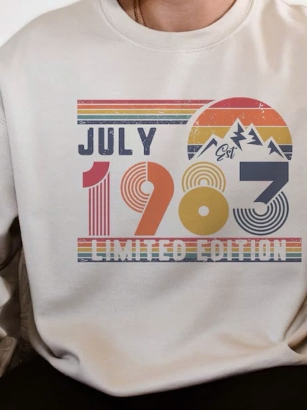 Gildan Cream Graphic Sweatshirt with Retro Rainbow Print